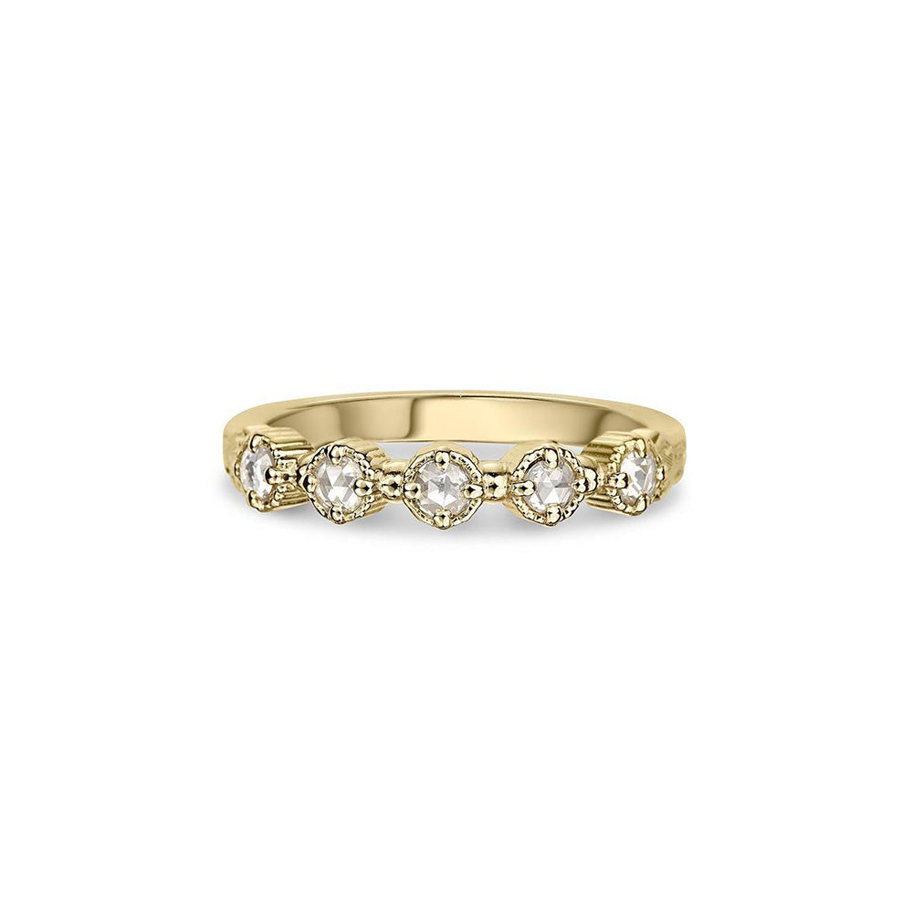 Crafted in 14KT yellow gold, this ring features five rose-cut diamonds in cupcake settings on a vintage-inspired hand engraved band.