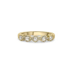 Crafted in 14KT yellow gold, this ring features five rose-cut diamonds in cupcake settings on a vintage-inspired hand engraved band.