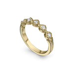 Crafted in 14KT yellow gold, this ring features five rose-cut diamonds in cupcake settings on a vintage-inspired hand engraved band.