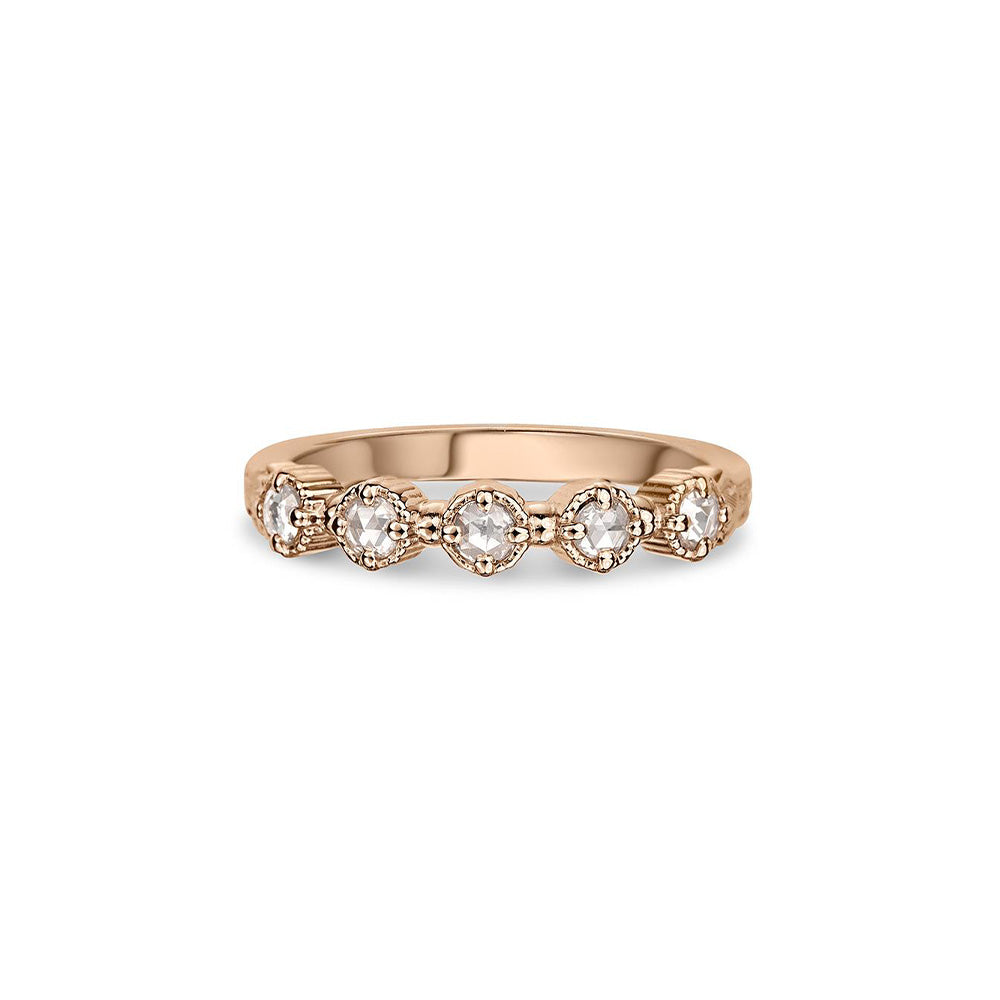 Crafted in 14KT rose gold, this ring features five rose-cut diamonds in cupcake settings on a vintage-inspired hand engraved band.
