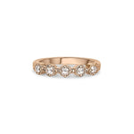 Crafted in 14KT rose gold, this ring features five rose-cut diamonds in cupcake settings on a vintage-inspired hand engraved band.