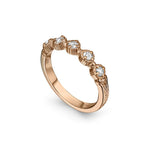 Crafted in 14KT rose gold, this ring features five rose-cut diamonds in cupcake settings on a vintage-inspired hand engraved band.
