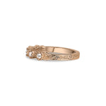 Crafted in 14KT rose gold, this ring features five rose-cut diamonds in cupcake settings on a vintage-inspired hand engraved band.