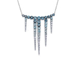 Crafted in 14KT white Certified Canadian Gold, this necklace features blue topaz and round brilliant-cut Canadian diamonds set in the shape of icicles.