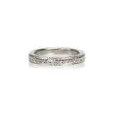 Crafted in 14KT white gold, this band is hand-engraved with an orange blossom design.