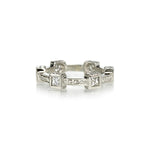 Crafted in 14KT white gold, this ring features six princess-cut diamonds in square bezels and flat edges with orange blossom hand-engravings.