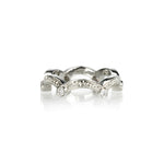 Crafted in 14KT white gold, this ring has a scallop design with orange blossom hand-engravings and six round brilliant-cut diamonds.