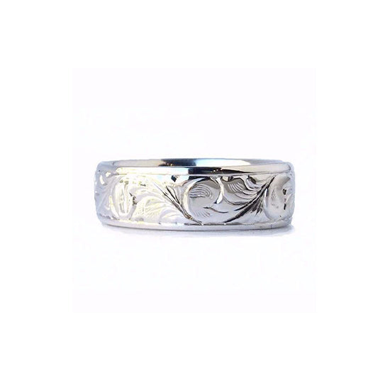 Crafted in 14KT white gold, this 7.5mm men’s ring features stunning paisley hand-engravings all around the band.