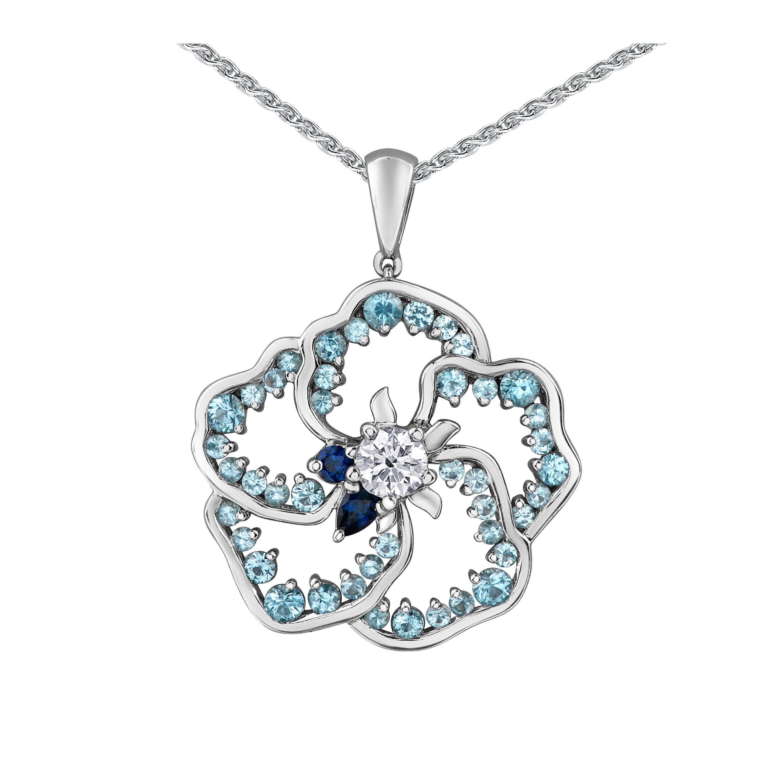 Crafted in 14K white Certified Canadian Gold, this pendant features a wildflower set with blue topaz, blue sapphires and a round brilliant-cut Canadian centre diamond .