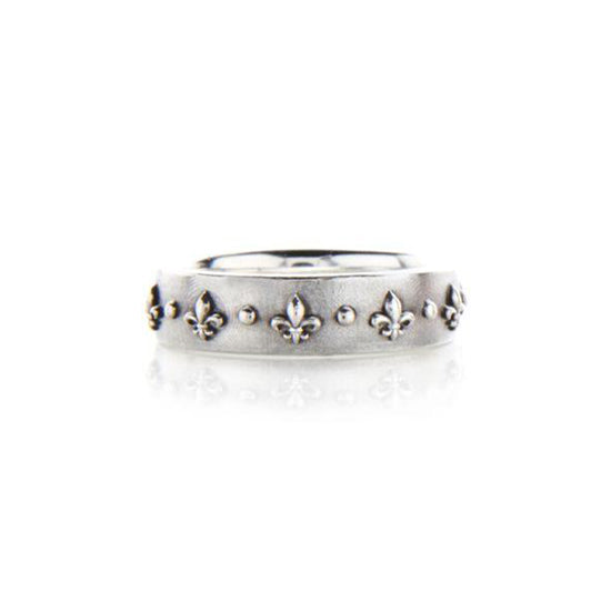Crafted in 14KT white gold, this ring is embossed with Fleur de Lys all around the band.