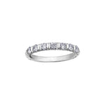 Crafted in 18kt Pure White™, this band features a fur-trim pattern set with round brilliant-cut Canadian diamonds.