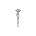 Crafted in 18kt Pure White™, this engagement ring features a diamond set emerald-shaped halo with an emerald-cut Canadian centre diamond. All on a diamond set infinity symbol-inspired band.