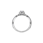 Crafted in 18kt Pure White™, this engagement ring features a diamond set emerald-shaped halo with an emerald-cut Canadian centre diamond. All on a diamond set infinity symbol-inspired band.