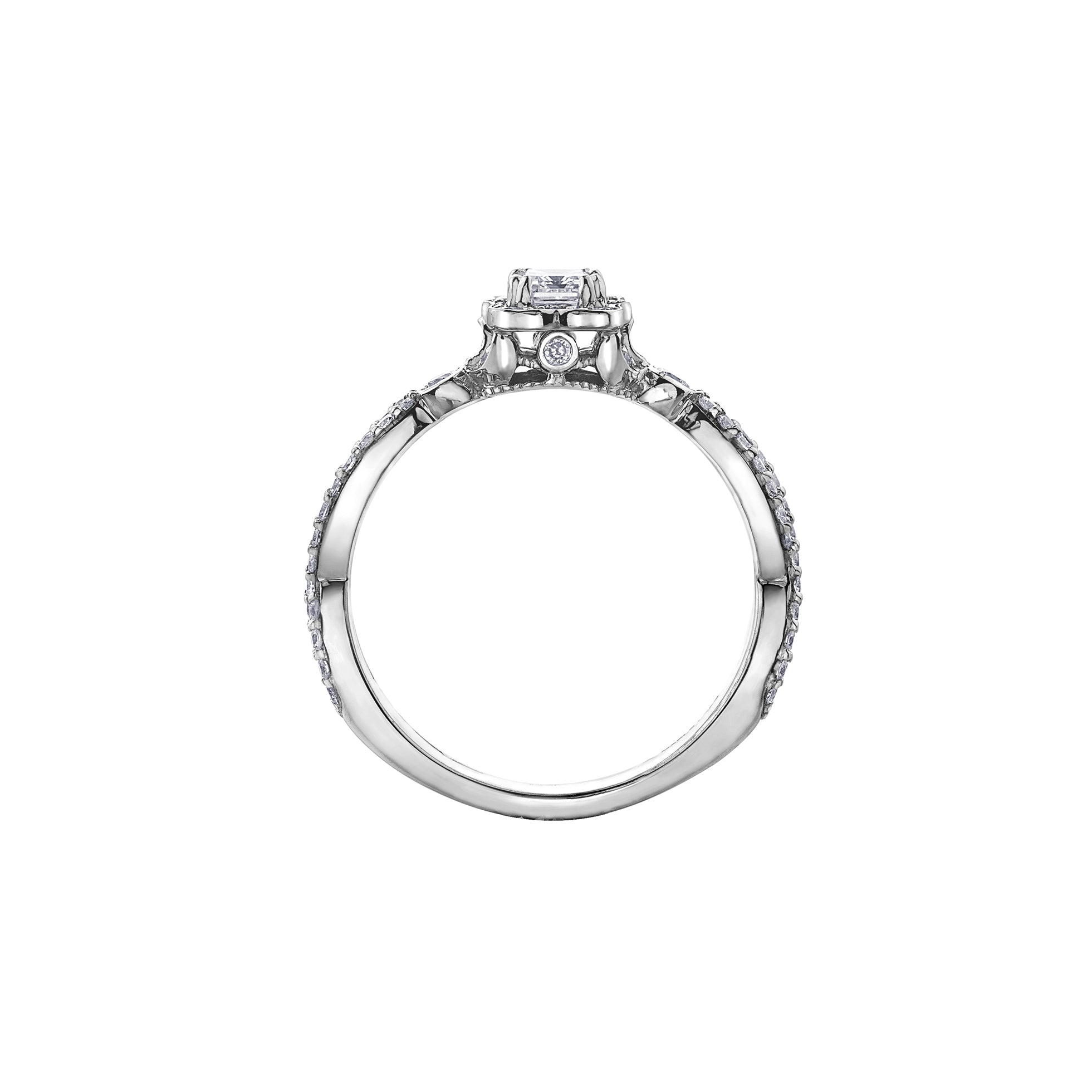 Crafted in 18kt Pure White™, this engagement ring features a diamond set emerald-shaped halo with an emerald-cut Canadian centre diamond. All on a diamond set infinity symbol-inspired band.