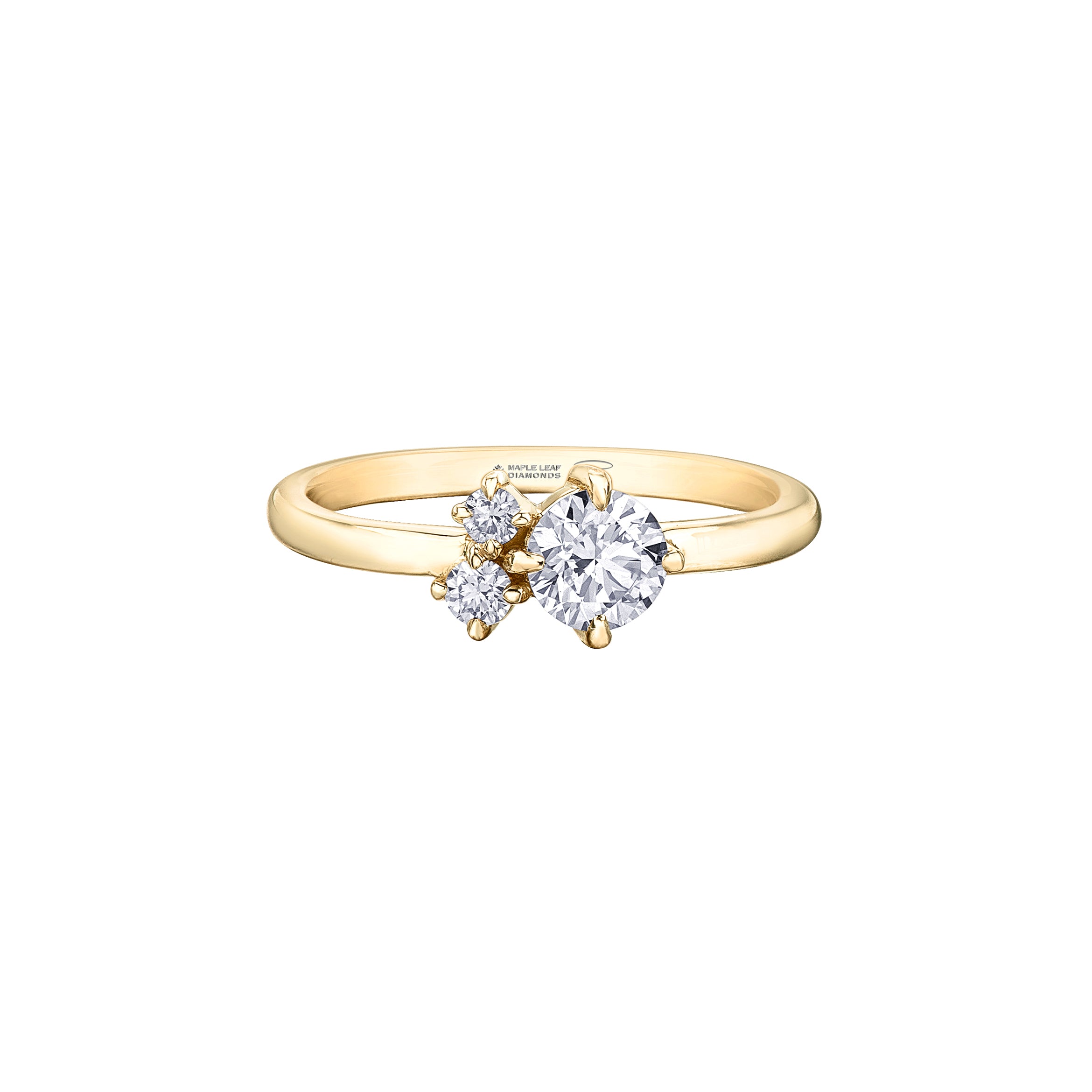 Crafted in white 14KT Canadian Certified Gold, this ring features three round brilliant cut Canadian diamonds.