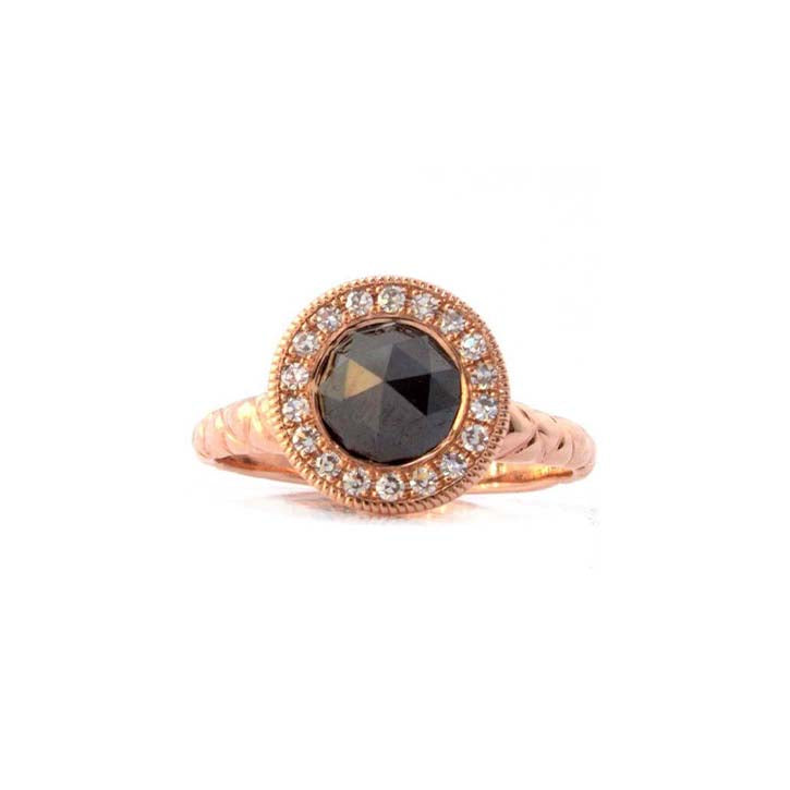 Crafted in 14KT rose gold, this ring features a diamond halo with a black rose-cut diamond centre and a quilted band.