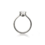 Crafted in 14KT white gold, this ring features a half-bezel set round brilliant-cut diamond with signature trademark on both sides.