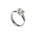 Crafted in 14KT white gold, this ring features a half-bezel set round brilliant-cut diamond with signature trademark on both sides.