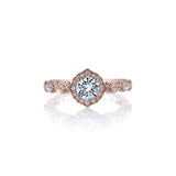 Crafted in 18KT rose and white gold, this lily of the valley flower-inspired ring is set with Canadian diamonds.