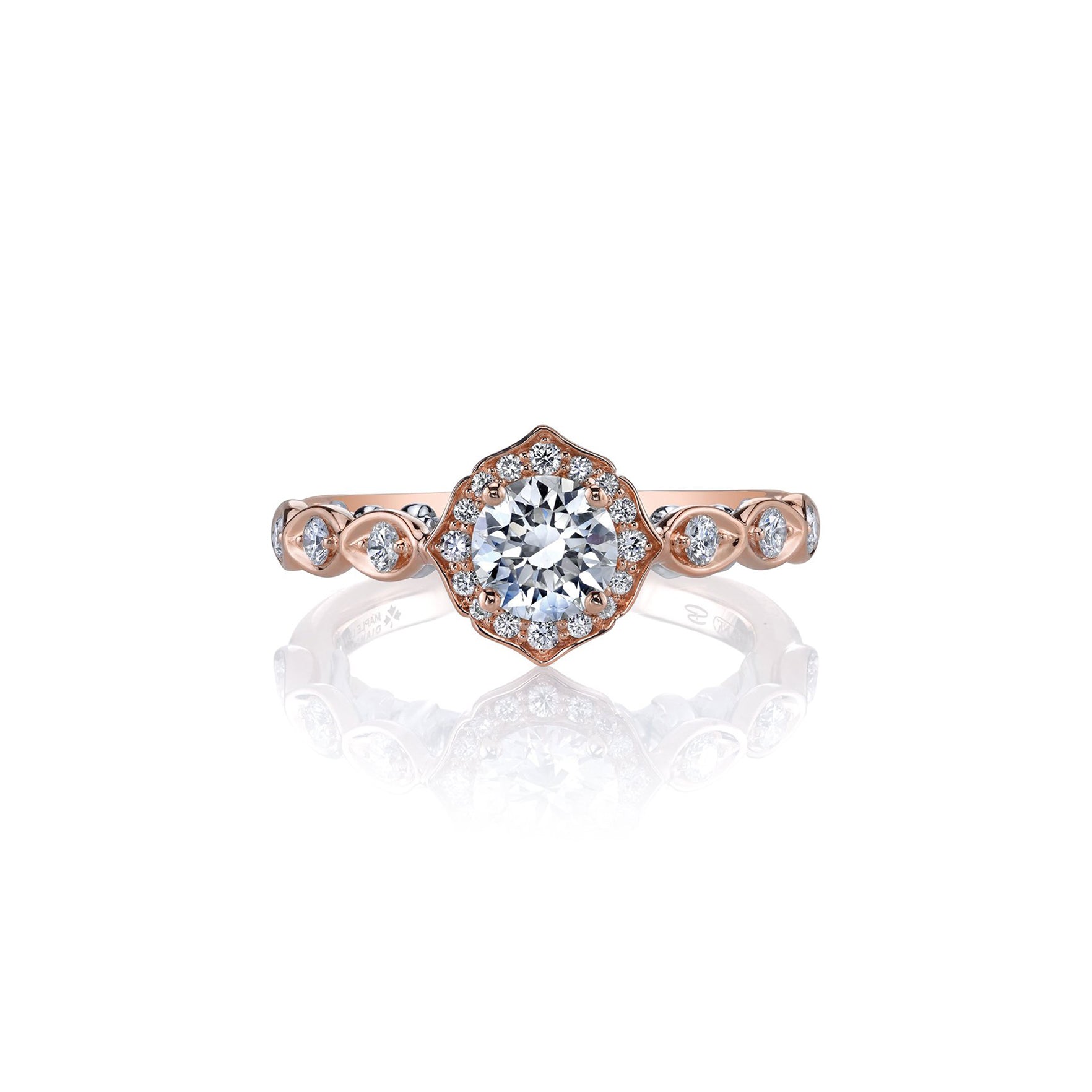 Crafted in 18KT rose and white gold, this lily of the valley flower-inspired ring is set with Canadian diamonds.