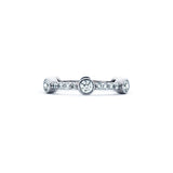 Crafted in 14KT white gold, this ring features six round brilliant-cut diamonds evenly spaced apart on a diamond set band.