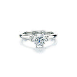 Crafted in 14KT white gold, this ring features a round brilliant-cut centre diamond and diamond details.