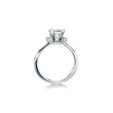 Crafted in 14KT white gold, this ring features a round brilliant-cut centre diamond and diamond details.