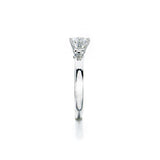 Crafted in 14KT white gold, this ring features a round brilliant-cut centre diamond and diamond details.