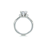 Crafted in 14KT white gold, this ring features a round brilliant-cut centre diamond on a diamond-set band.