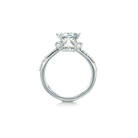 Crafted in 14KT white gold, this ring features a princess-cut centre diamond on a diamond-set band.