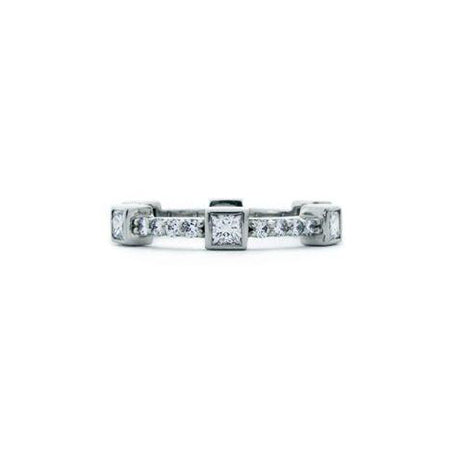 Crafted in 14KT white gold, this ring features six princess-cut diamonds evenly spaced apart on a diamond set band.