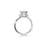 Crafted in 14KT white gold, this ring features a princess-cut centre diamond and round brilliant-cut diamond details. 