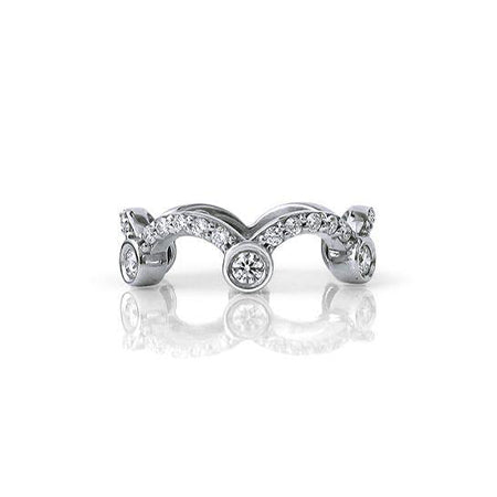 Crafted in 14KT white gold, this ring is shaped like a tiara and set with round brilliant cut diamonds.