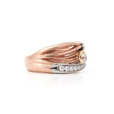 Crafted in 14KT rose, white, and yellow Certified Canadian Gold, this ring features a sunset scene with a round brilliant-cut Canadian diamond sun, diamond set lake, and Group of Seven inspired tree.