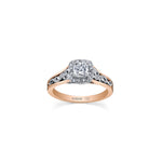 Crafted in 18KT white and rose Certified Canadian Gold, this engagement ring features a diamond halo with a cushion-cut Canadian centre diamond on a diamond set band with a rose vine design.