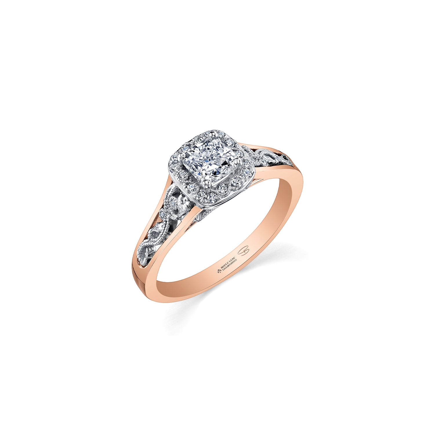 Crafted in 18KT white and rose Certified Canadian Gold, this engagement ring features a diamond halo with a cushion-cut Canadian centre diamond on a diamond set band with a rose vine design.