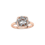 Crafted in rose and white 14KT Candian Certified Gold, this ring features a rose vine design set with round brilliant-cut Canadian diamonds in a frame setting. 