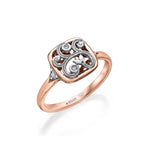 Crafted in rose and white 14KT Candian Certified Gold, this ring features a rose vine design set with round brilliant-cut Canadian diamonds in a frame setting. 