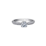 Crafted in 18kt Pure White™, this engagement ring features a round brilliant-cut Canadian diamond cradled by 4-petal water lily flower on a diamond set band.