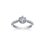 Crafted in 18kt Pure White™, this engagement ring features a round brilliant-cut Canadian diamond cradled by 6-petal water lily flower on a diamond set band. 