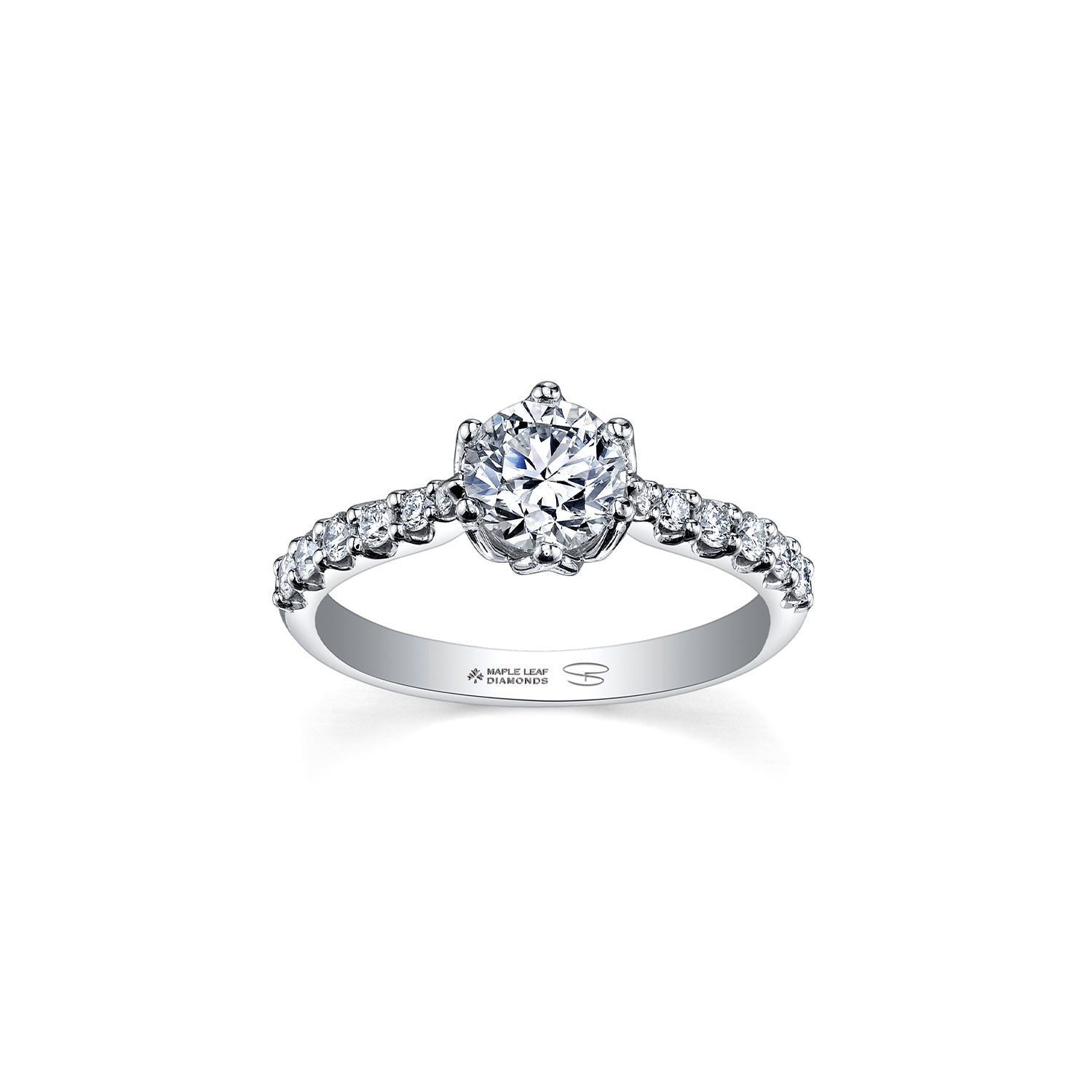 Crafted in 18kt Pure White™, this engagement ring features a round brilliant-cut Canadian diamond cradled by 6-petal water lily flower on a diamond set band.