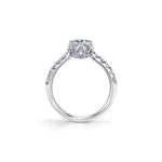 Crafted in 18kt Pure White™, this engagement ring features a round brilliant-cut Canadian diamond cradled by 6-petal water lily flower on a diamond set band.