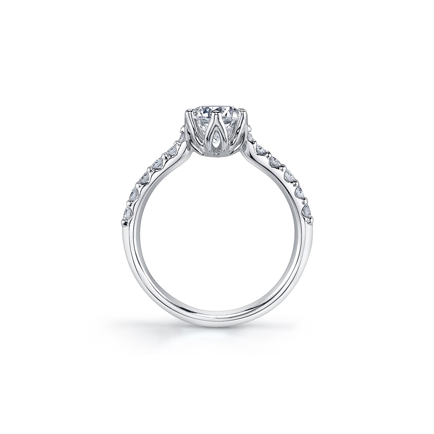 Crafted in 18kt Pure White™, this engagement ring features a round brilliant-cut Canadian diamond cradled by 6-petal water lily flower on a diamond set band. 