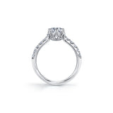 Crafted in 18kt Pure White™, this engagement ring features a round brilliant-cut Canadian diamond cradled by 6-petal water lily flower on a diamond set band.