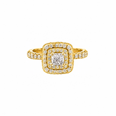 Crafted in 18KT Certified Canadian Gold, this ring features a diamond set double halo with a cushion-cut Canadian centre diamond. Diamond set band and has hidden maple leaf details.