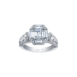 18k white and yellow gold ring with emerald-cut Canadian diamond, frost engravings, diamond halo, and blue sapphire.