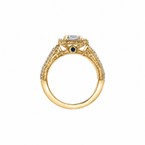 18k white and yellow gold ring with emerald-cut Canadian diamond, frost engravings, diamond halo, and blue sapphire.