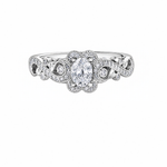 18kt gold engagement ring with oval-cut Canadian diamond, diamond side stones, and intricate rose vine detailing, 0.45 TDW.