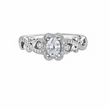 18kt gold engagement ring with oval-cut Canadian diamond, diamond side stones, and intricate rose vine detailing, 0.45 TDW.