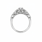 18kt gold engagement ring with oval-cut Canadian diamond, diamond side stones, and intricate rose vine detailing, 0.45 TDW.